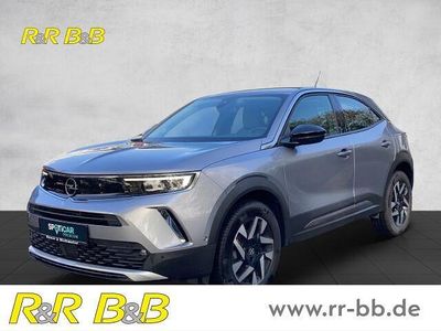 Gebraucht Opel Mokka Elegance 131 PS (96 kW) 2021 Kontrast grau/quarz silber SUV