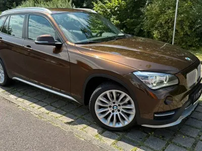 Gebraucht BMW X1 xLine 184 PS (135 kW) 2014 Braun SUV