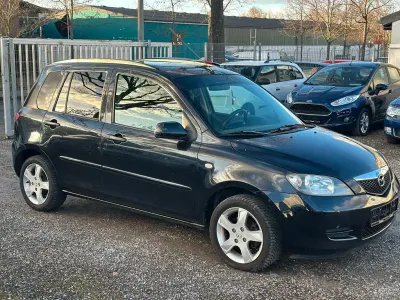 Używany Mazda 2 Comfort 68 KM (50 kW) 2004 Czarny Hatchback