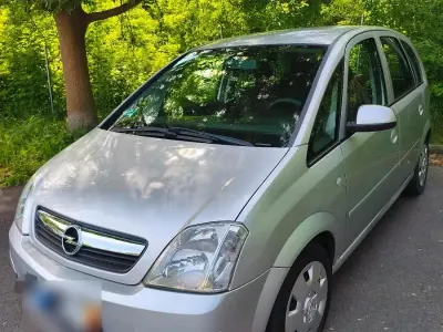 Używany Opel Meriva 105 KM (77 kW) 2009 Srebrny Minivan