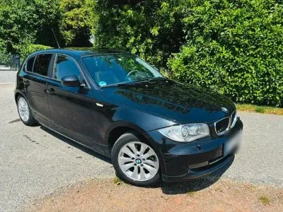 Gebraucht BMW 116 115 PS (84 kW) 2009 Schwarz Kleinwagen