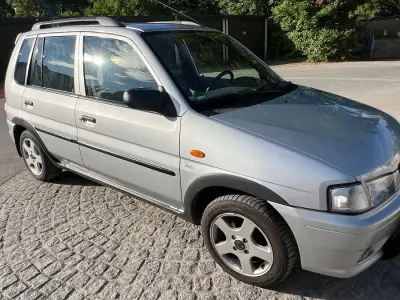 Occasion Mazda Demio Exclusive 72 PK (52 kW) 1999 Grijs Hatchback