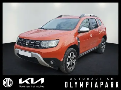 Używany Dacia Duster Comfort 91 KM (66 kW) 2022 Pomarańczowy SUV