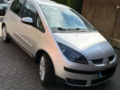 Gebraucht Mitsubishi Colt Motion 95 PS (69 kW) 2009 Silber Kleinwagen