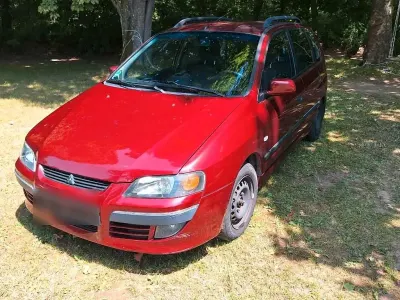 Gebraucht Mitsubishi Space Star 98 PS (72 kW) 2003 Rot Van / Kleinbus