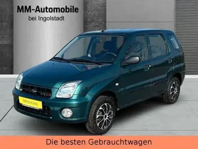 Begagnad Subaru Justy 94 HK (69 kW) 2005 Grön Halvkombi