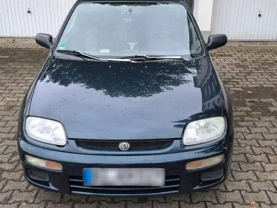Gebraucht Mazda 323 88 PS (64 kW) 1996 Grün Coupé