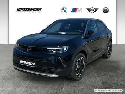 Gebraucht Opel Mokka-e Ultimate 100 kW (136 PS) 2022 Diamant schwarz/karbon schwarz SUV