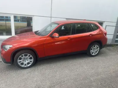 Gebraucht BMW X1 150 PS (110 kW) 2014 Valencia orange SUV