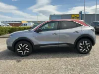 Gebraucht Opel Mokka Elegance 101 PS (74 kW) 2021 Kontrast grau/quarz silber SUV