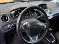 Używany Ford Fiesta Titanium 101 KM (74 kW) 2013 Czerwony Sedan/Limuzyna