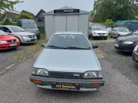 Gebraucht Mazda 323 60 PS (44 kW) 1989 Grau Kleinwagen