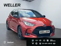 Gebraucht Toyota Yaris Basis 116 PS (85 kW) 2023 Infernoorange metallic, dach schwarz Kleinwagen