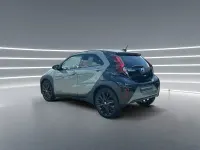 Gebraucht Toyota Aygo X x-style 72 PS (52 kW) 2024 Urban khaki / night sky black SUV