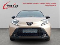 Gebraucht Toyota Aygo X Style 72 PS (52 kW) 2022 Ginger beige metallic/ night sky black SUV