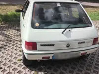 Gebraucht Peugeot 205 75 PS (55 kW) 1991 Weiß Kleinwagen