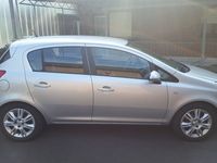 Używany Opel Corsa 118 KM (86 kW) 2010 Srebrny Hatchback