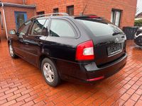Gebraucht Skoda Octavia Ambition 105 PS (77 kW) 2012 Schwarz Kombi