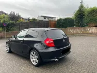 Gebraucht BMW 116 116 PS (85 kW) 2010 Schwarz Kleinwagen