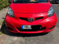 Gebraucht Toyota Aygo 68 PS (50 kW) 2009 Rot Kleinwagen