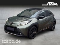 Gebraucht Toyota Aygo X x-style 72 PS (52 kW) 2022 Cardamon green metallic/ night sky black SUV