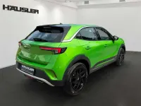 Gebraucht Opel Mokka Elegance 131 PS (96 kW) 2022 Matcha green/ikone gruen SUV