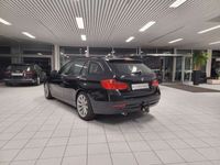 gebraucht BMW 318 d Touring Leder/Bi-Xenon/Navi/SHZ/BT/AHK/PDC.