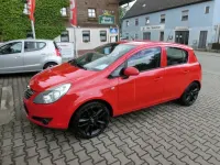 Gebraucht Opel Corsa Basis 60 PS (44 kW) 2009 Magma rot (b) Kleinwagen