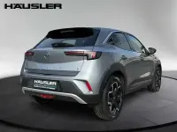 Używany Opel Mokka-e Ultimate 100 kW (136 KM) 2022 Srebrny SUV