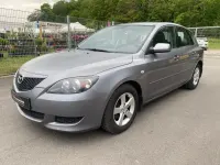 Używany Mazda 3 Comfort 105 KM (77 kW) 2004 Szary Sedan/Limuzyna