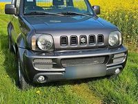 Second-hand Suzuki Jimny Style 86 CP (63 kW) 2011 Gri SUV