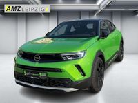 Gebraucht Opel Mokka Ultimate 131 PS (96 kW) 2023 Lackierung matcha green/typ aussenverkle (metallic) SUV