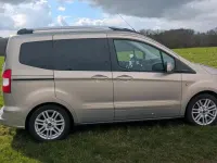 Gebraucht Ford Tourneo Courier 101 PS (74 kW) 2018 Silber Van / Kleinbus