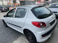 Gebraucht Peugeot 206+ 73 PS (53 kW) 2011 Weiß Kleinwagen