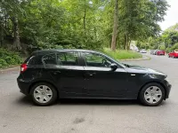 Gebraucht BMW 118 129 PS (94 kW) 2007 Schwarz Kleinwagen