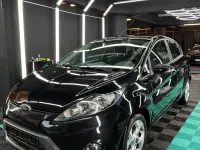 Gebraucht Ford Fiesta 95 PS (69 kW) 2012 Schwarz Limousine