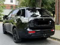 Gebraucht Mitsubishi Outlander P-HEV 121 PS (88 kW) 2014 Schwarz SUV