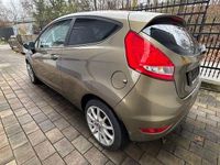 Gebraucht Ford Fiesta Trend 82 PS (60 kW) 2012 Braun Kleinwagen