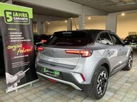 Gebraucht Opel Mokka-e Ultimate 100 kW (136 PS) 2022 Kontrast grau/quarz silber SUV