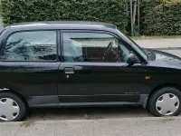 Gebraucht Daihatsu Cuore 56 PS (41 kW) 2002 Schwarz Kleinwagen