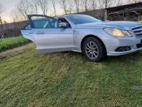 Second-hand Mercedes E200 184 CP (135 kW) 2011 Argintiu Berlinǎ