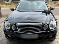 Second-hand Mercedes E200 184 CP (135 kW) 2006 Negru Berlinǎ
