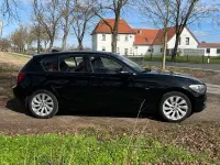 Gebraucht BMW 116 Sport Line 136 PS (100 kW) 2012 Schwarz Kleinwagen