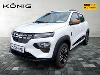 Gebraucht Dacia Spring Extreme 47 kW (65 PS) 2023 Kaolinweiß Kleinwagen