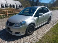 Second-hand Suzuki SX4 120 CP (88 kW) 2012 Argintiu Berlinǎ