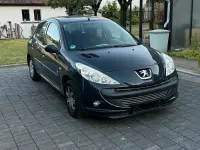 Gebraucht Peugeot 206 60 PS (44 kW) 2012 Grau Limousine