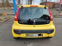 Gebraucht Peugeot 107 Filou 68 PS (50 kW) 2010 Gelb Kleinwagen