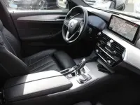 Gebraucht BMW 520 Sport Line 190 PS (139 kW) 2023 Black sapphire metallic Kombi