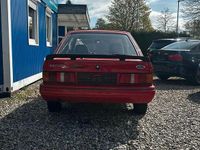 Second-hand Ford Escort 60 CP (44 kW) 1987 Roșu Coupe