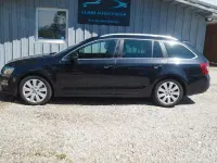 Używany Skoda Octavia RS 184 KM (135 kW) 2014 Czarny Kombi